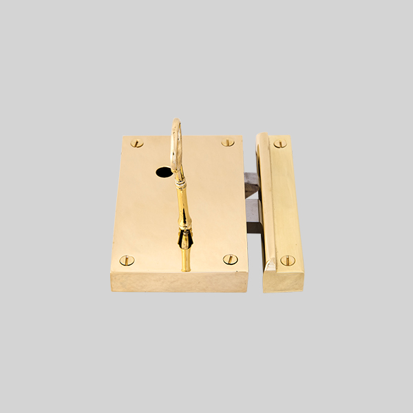 Shown as right hand with a polished brass finish.