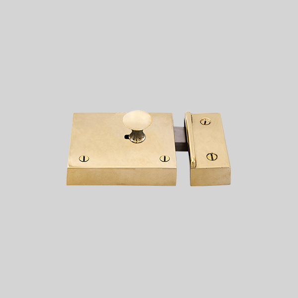 Shown as right hand with a polished brass finish.