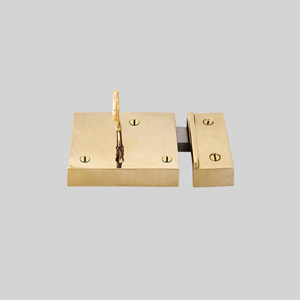 Shown as right hand with a polished brass finish.