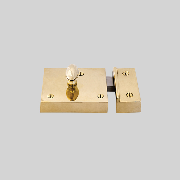 Shown as right hand with a polished brass finish.