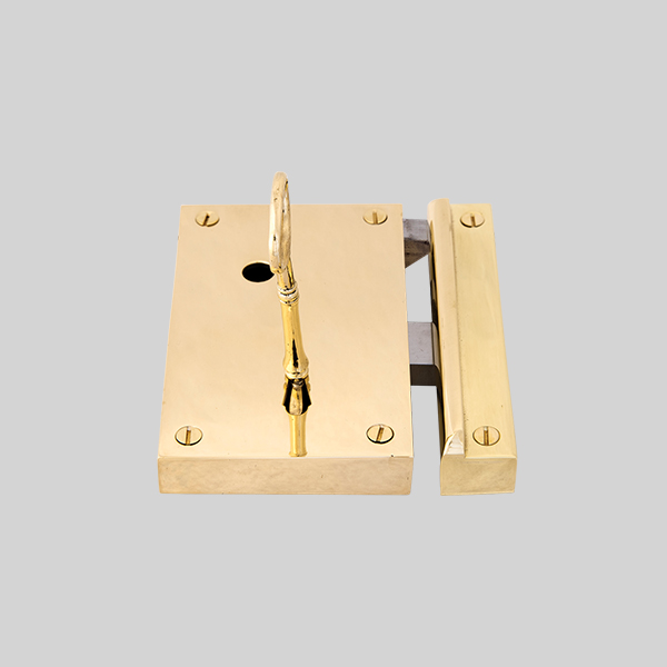 Shown as right hand with a polished brass finish.
