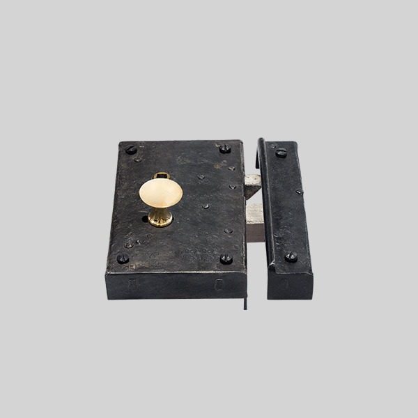 Shown as right hand with a dark wax iron finish.