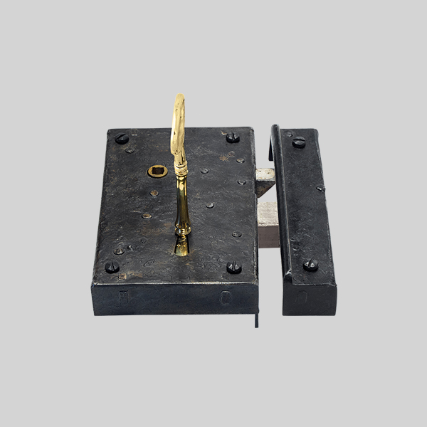 Shown as right hand with a dark wax iron finish.