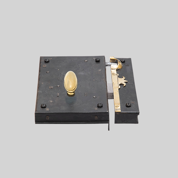 Shown as right hand with a dark wax iron finish.