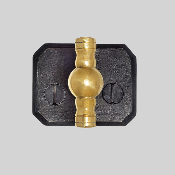 Shown with a dark wax iron and polished brass finish.