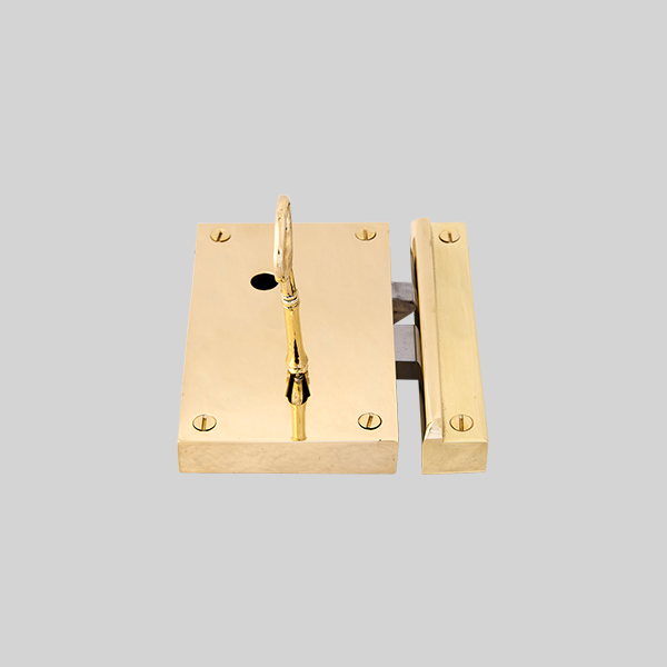 Shown as right hand with a polished brass finish.