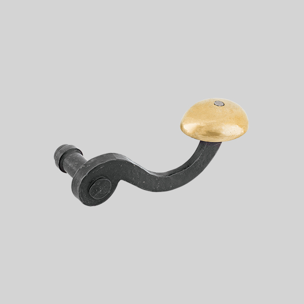 Shown with a dark wax iron finish and polished brass knob.
