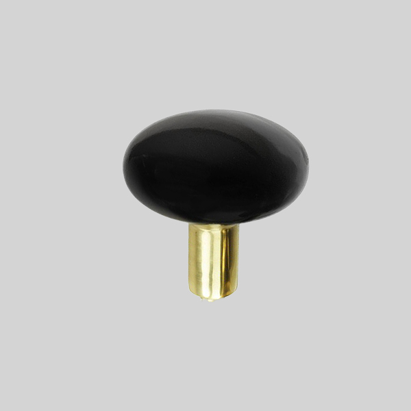 Shown in black porcelain with polished brass finish.