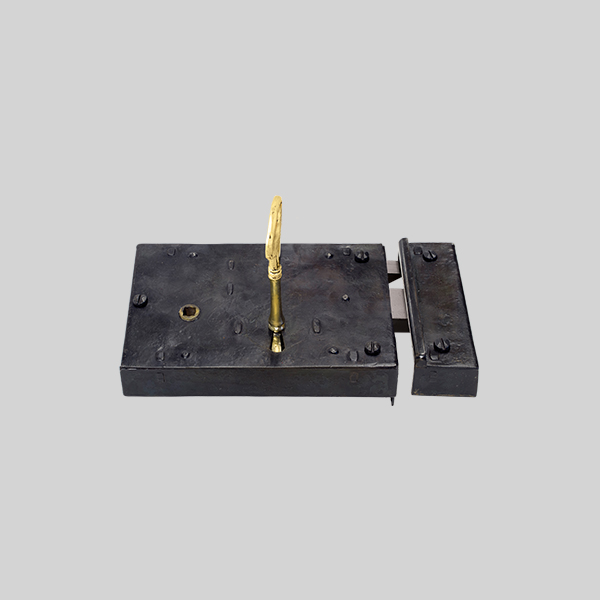 Shown as right hand with a dark wax iron finish.