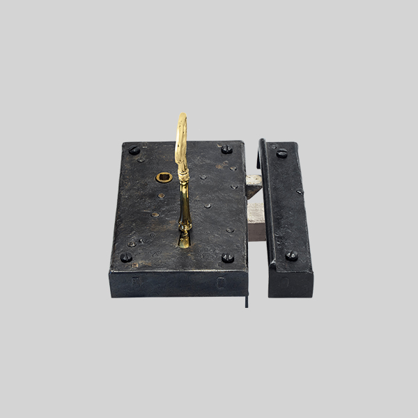 Shown as right hand with a dark wax iron finish.